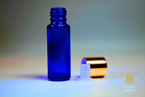 Empty sample  5ml Slender Blue bottle with insert dropper and shiny gold screw lid.