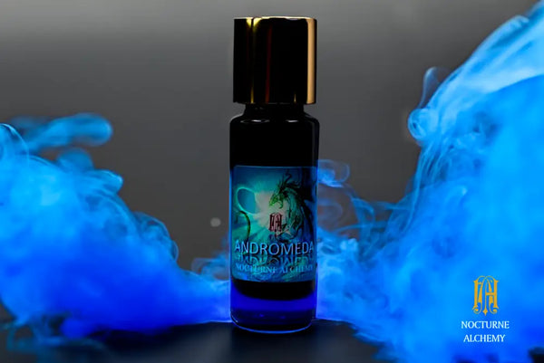 Andromeda Dragon in 5ml Slender Blue Bottle with gold-toned screw lid and orifice reducer insert