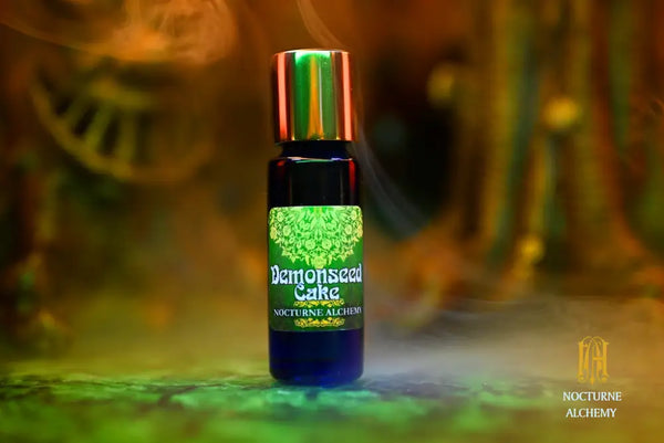 Demonseed Cake 5ml Slender Blue Bottle with insert dropper and gold-toned screw lid.