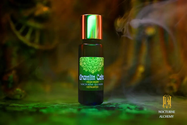 Gremlin Cake 5ml Slender Blue Bottle with insert dropper and gold-toned screw lid.