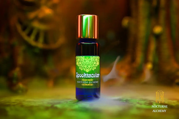 Spooktacular 5ml Slender Blue Bottle with insert dropper and gold-toned screw lid.