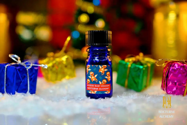Holiday Baby Dragon - 5ml cobalt blue bottle no insert, phenolic screw lid.  