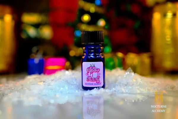 Pink Oudh - 5ml cobalt blue bottle no insert, phenolic screw lid.  