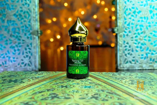 6ml amber cylindrical bottle with flat insert/dropper and golden domed twist lid.