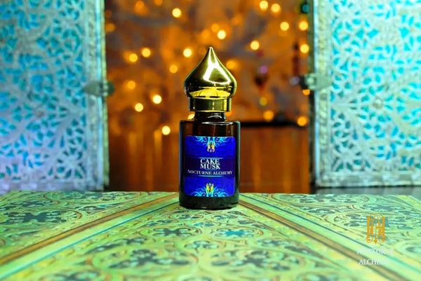 6ml amber cylindrical bottle with flat insert/dropper and golden domed twist lid.