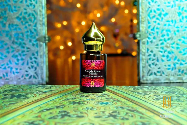 6ml amber cylindrical bottle with flat insert/dropper and golden domed twist lid.