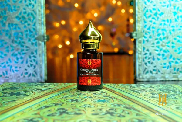 6ml amber cylindrical bottle with flat insert/dropper and golden domed twist lid.