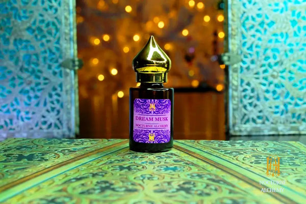 6ml amber cylindrical bottle with flat insert/dropper and golden domed twist lid.