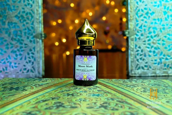 6ml amber cylindrical bottle with flat insert/dropper and golden domed twist lid.