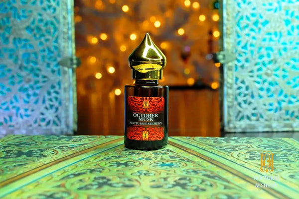 6ml amber cylindrical bottle with flat insert/dropper and golden domed twist lid.