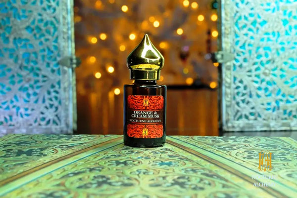 6ml amber cylindrical bottle with flat insert/dropper and golden domed twist lid.