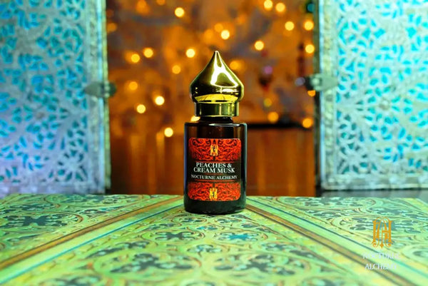 6ml amber cylindrical bottle with flat insert/dropper and golden domed twist lid.