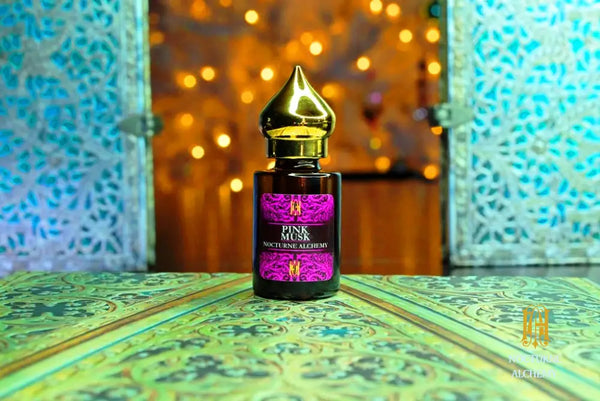 6ml amber cylindrical bottle with flat insert/dropper and golden domed twist lid.