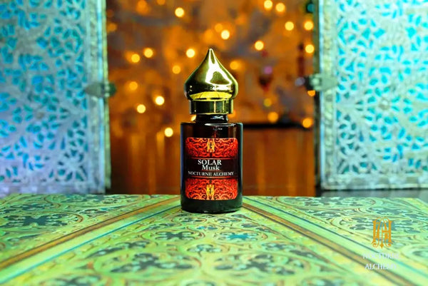 6ml amber cylindrical bottle with flat insert/dropper and golden domed twist lid.