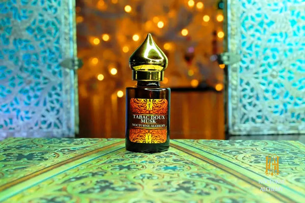 6ml amber cylindrical bottle with flat insert/dropper and golden domed twist lid.