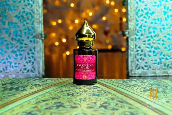 6ml amber cylindrical bottle with flat insert/dropper and golden domed twist lid.