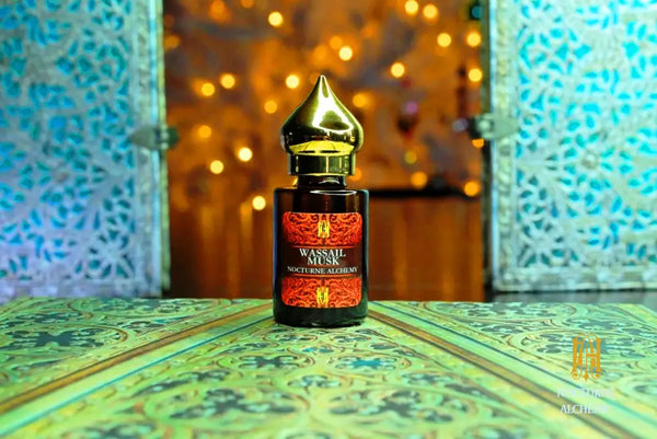 6ml amber cylindrical bottle with flat insert/dropper and golden domed twist lid.