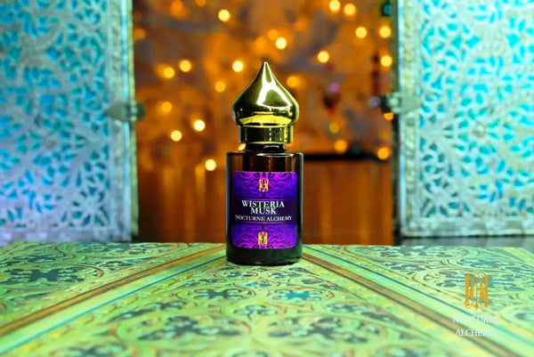 6ml amber cylindrical bottle with flat insert/dropper and golden domed twist lid.