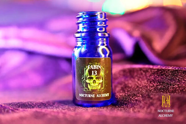 5ml traditional blue bottle with no insert/dropper, and twist black lid