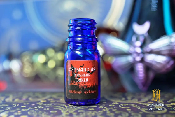 5ml traditional blue bottle with no insert/dropper, and twist black lid