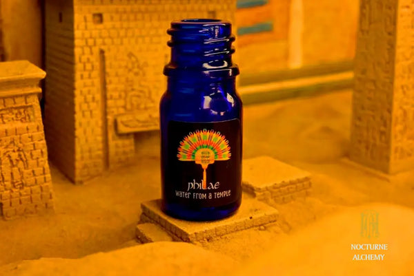 5ml traditional cobalt blue bottle with no insert/orifice and twist phenolic lid