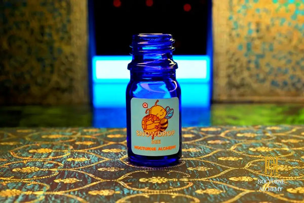 5ml traditional cobalt blue bottle with no insert/orifice and twist phenolic lid