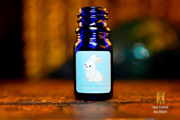 5ml traditional cobalt blue bottle with no insert/orifice and twist phenolic lid - Confident Bunny