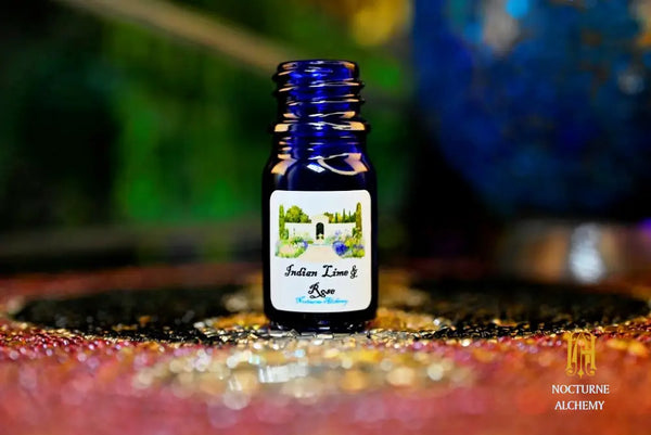 5ml traditional cobalt blue bottle with no insert/orifice and twist phenolic lid - Indian Lime & Rose