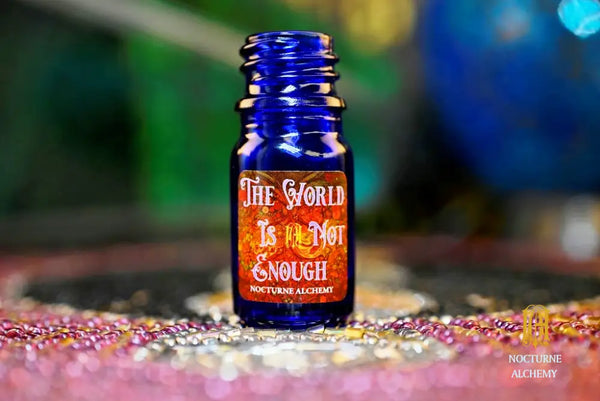 5ml traditional cobalt blue bottle with no insert/orifice and twist phenolic lid - The World Is Not Enough