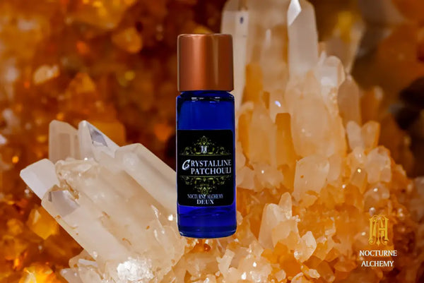 5ml Slender Blue bottle with copper lid and dropper insert. Precisely 5ml.  Crystalline/Patchouli