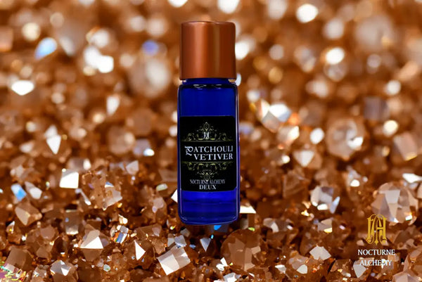 5ml Slender Blue bottle with copper lid and dropper insert. Precisely 5ml.  Patchouli/Vetiver