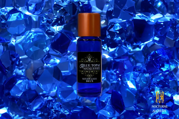 5ml Slender Blue bottle with copper lid and dropper insert. Precisely 5ml.  BlueTopaz/SantalumWhite