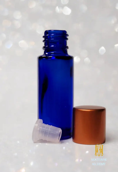 Photo of 5ml Slender blue, copper screw lid and insert dropper