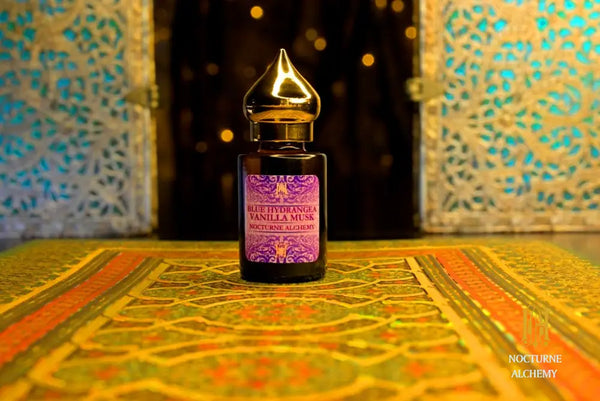 6ml amber cylindrical bottle with flat insert/dropper and golden domed twist lid.