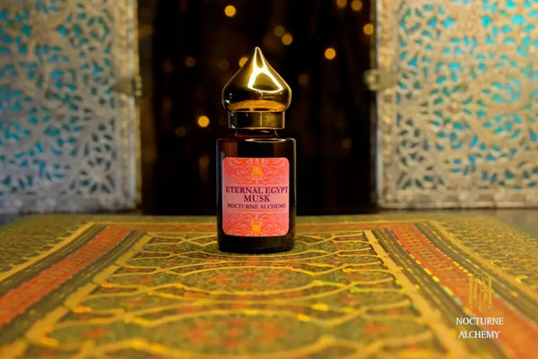 6ml amber cylindrical bottle with flat insert/dropper and golden domed twist lid.