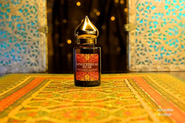 6ml amber cylindrical bottle with flat insert/dropper and golden domed twist lid.