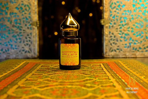 6ml amber cylindrical bottle with flat insert/dropper and golden domed twist lid.