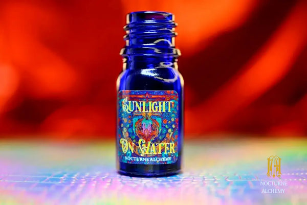 Sunlight on Water - 5ml cobalt blue bottle no insert, phenolic screw lid. 