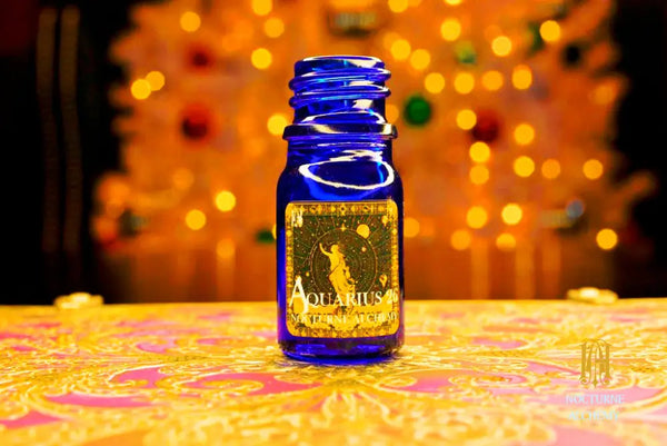 5ml blue bottle with no insert/dropper and black phenolic twist lid