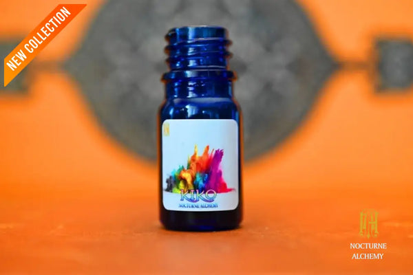 Kiki in 5ml Cobalt Blue bottle