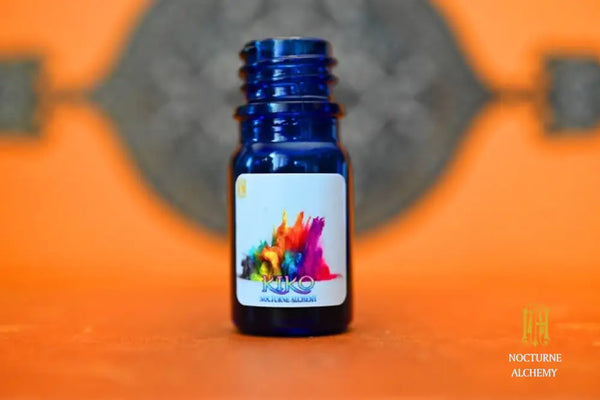 Kiki in 5ml Cobalt Blue bottle