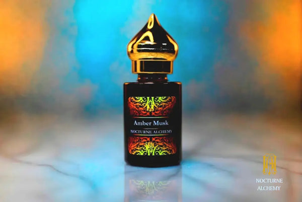6ml amber cylindrical bottle with gold-toned domed lid and insert.  Amber Musk
