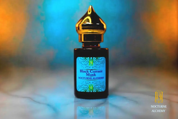 6ml amber cylindrical bottle with gold-toned domed lid and insert. Black Currant Musk.