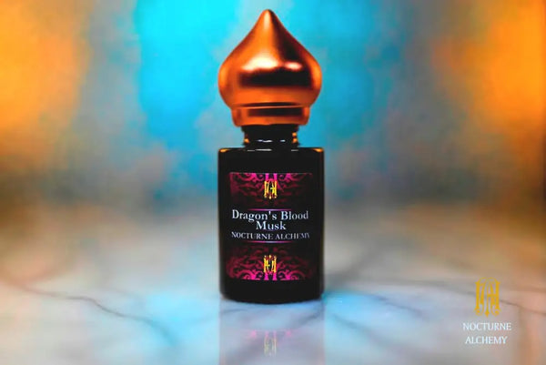 6ml amber cylindrical bottle with matte copper-toned domed lid and insert.  Dragon's Blood Musk