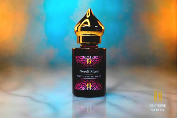 6ml amber cylindrical bottle with gold-toned domed lid and insert.  Neroli Musk