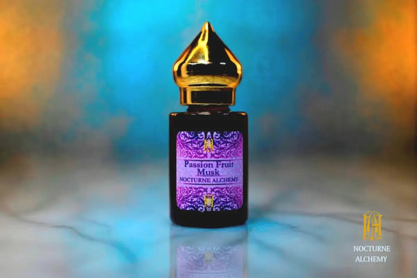 6ml amber cylindrical bottle with gold-toned domed lid and insert.  Passion Fruit Musk
