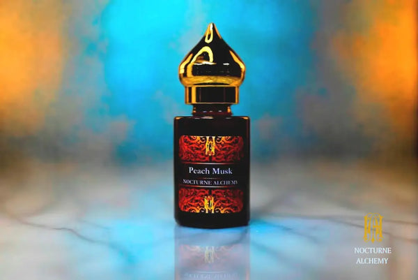 6ml amber cylindrical bottle with gold-toned domed lid and insert.  Peach Musk