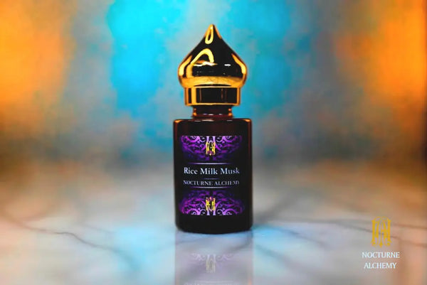 6ml amber cylindrical bottle with gold-toned domed lid and insert.  Rice Milk Musk