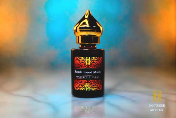 6ml amber cylindrical bottle with gold-toned domed lid and insert.   Sandalwood Musk