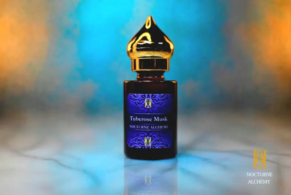 6ml amber cylindrical bottle with gold-toned domed lid and insert.  Tuberose Musk